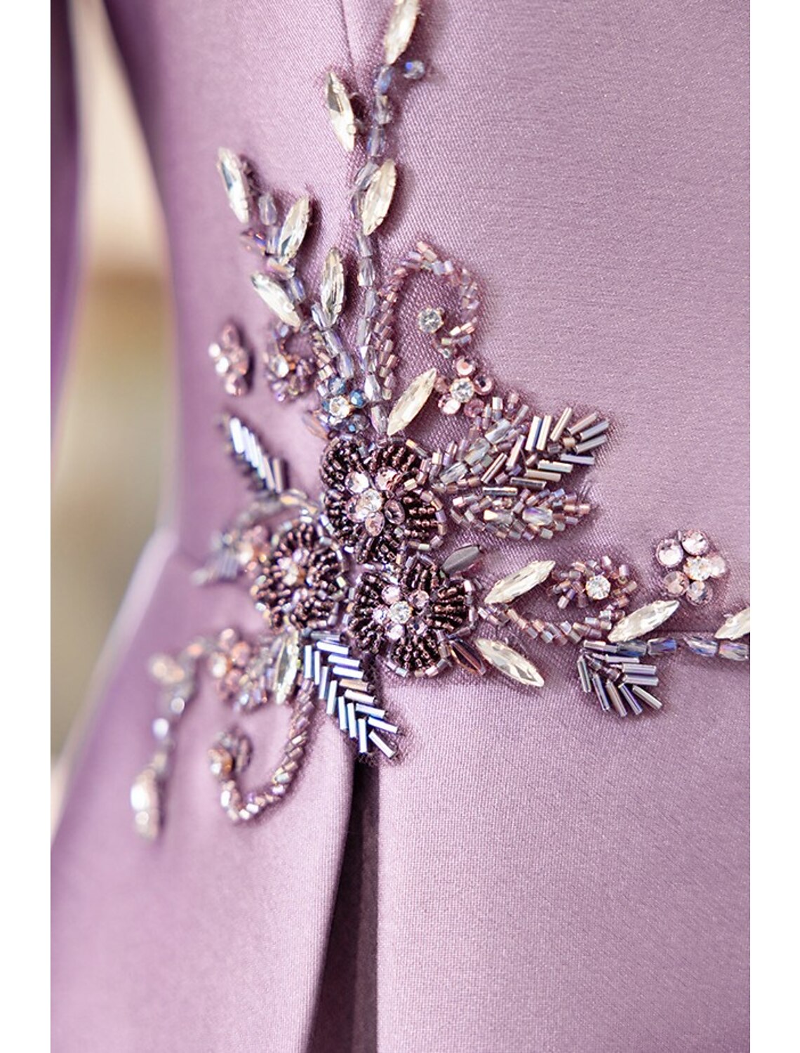 Back view of the elegant two-piece satin tea length dress.