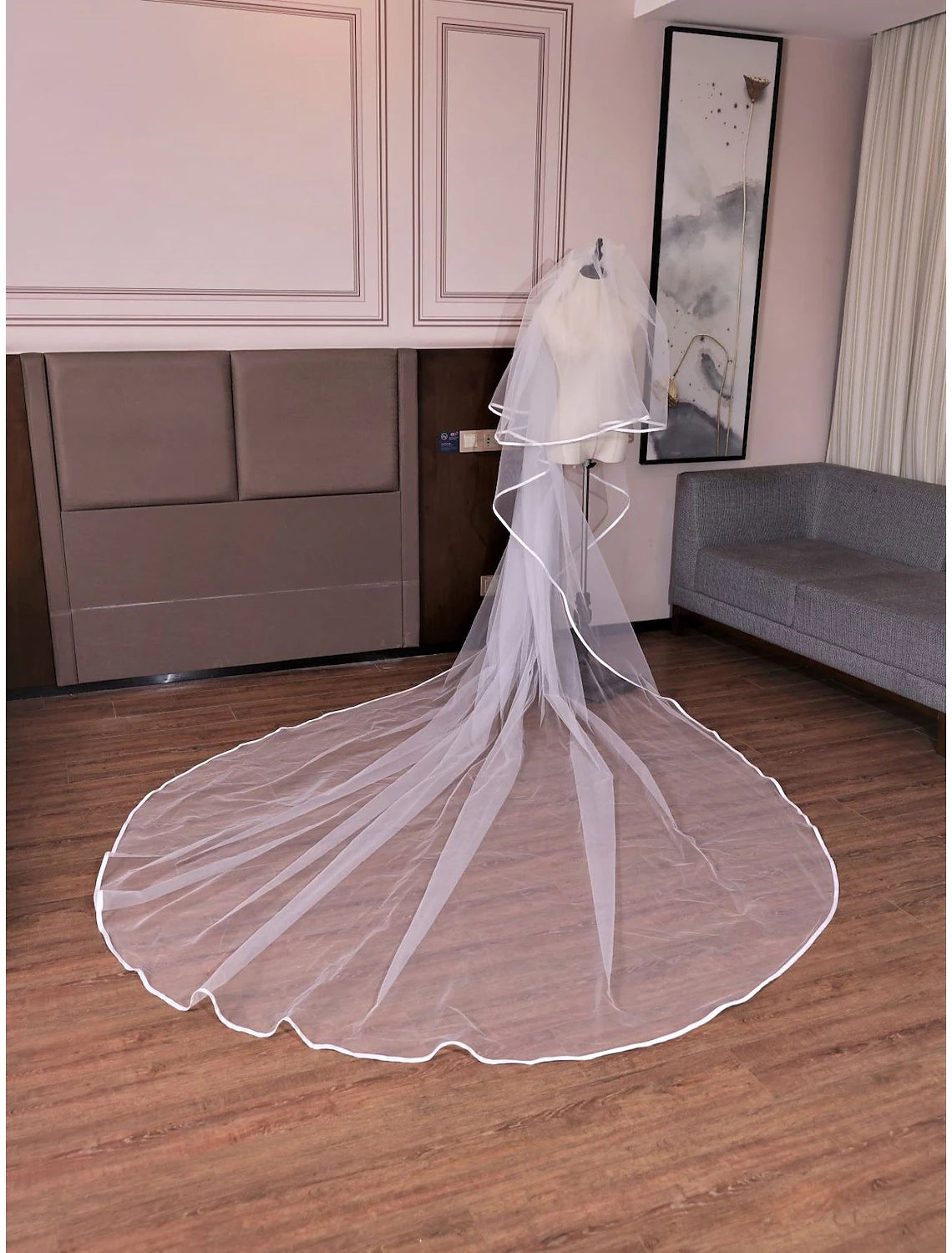 Close-up of the soft, sheer tulle fabric of a vintage-style wedding veil.