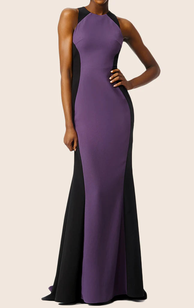 Elegant two-tone mermaid prom gown with V-neck and spaghetti straps.
