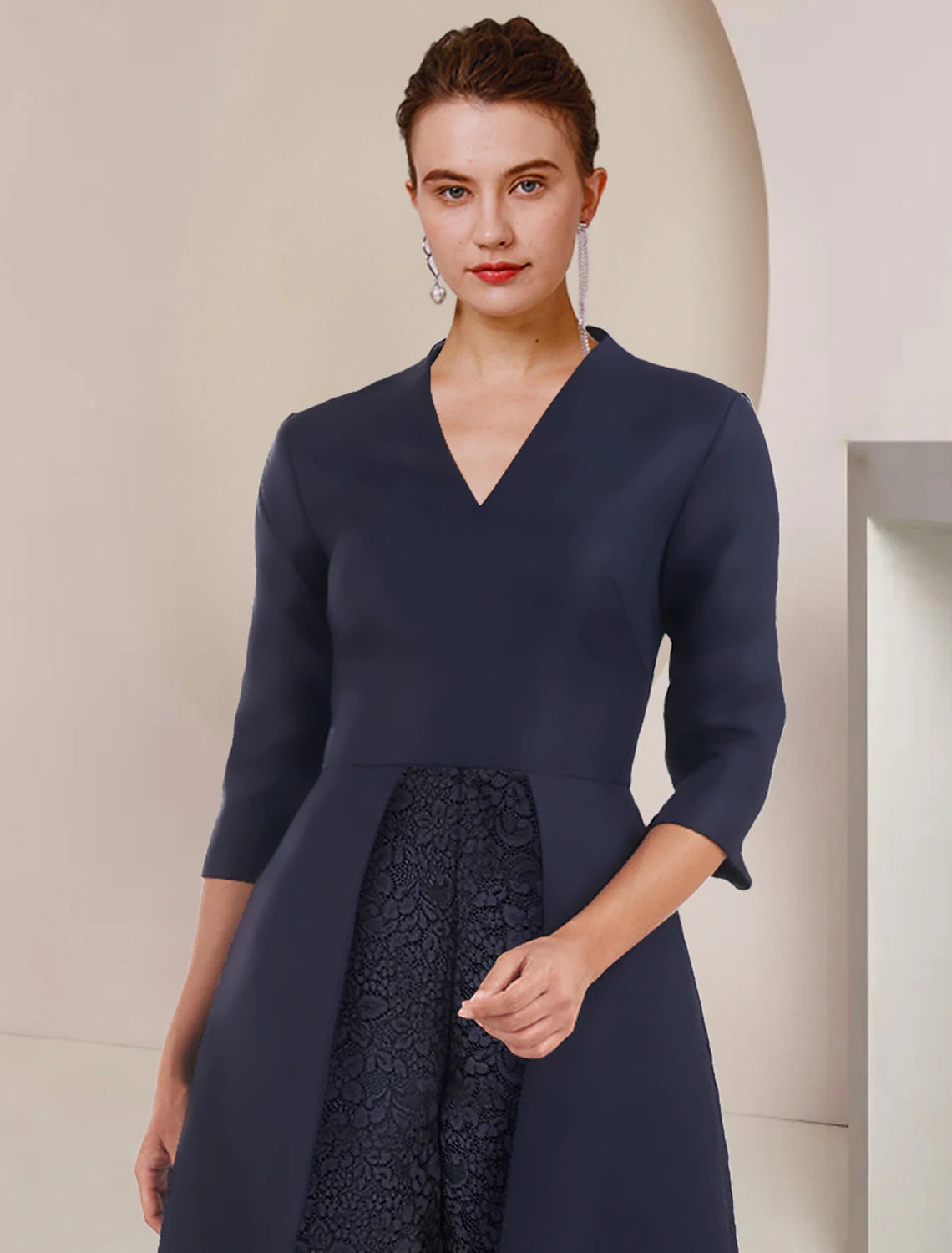 Sophisticated solid color jumpsuit pantsuit for formal occasions.