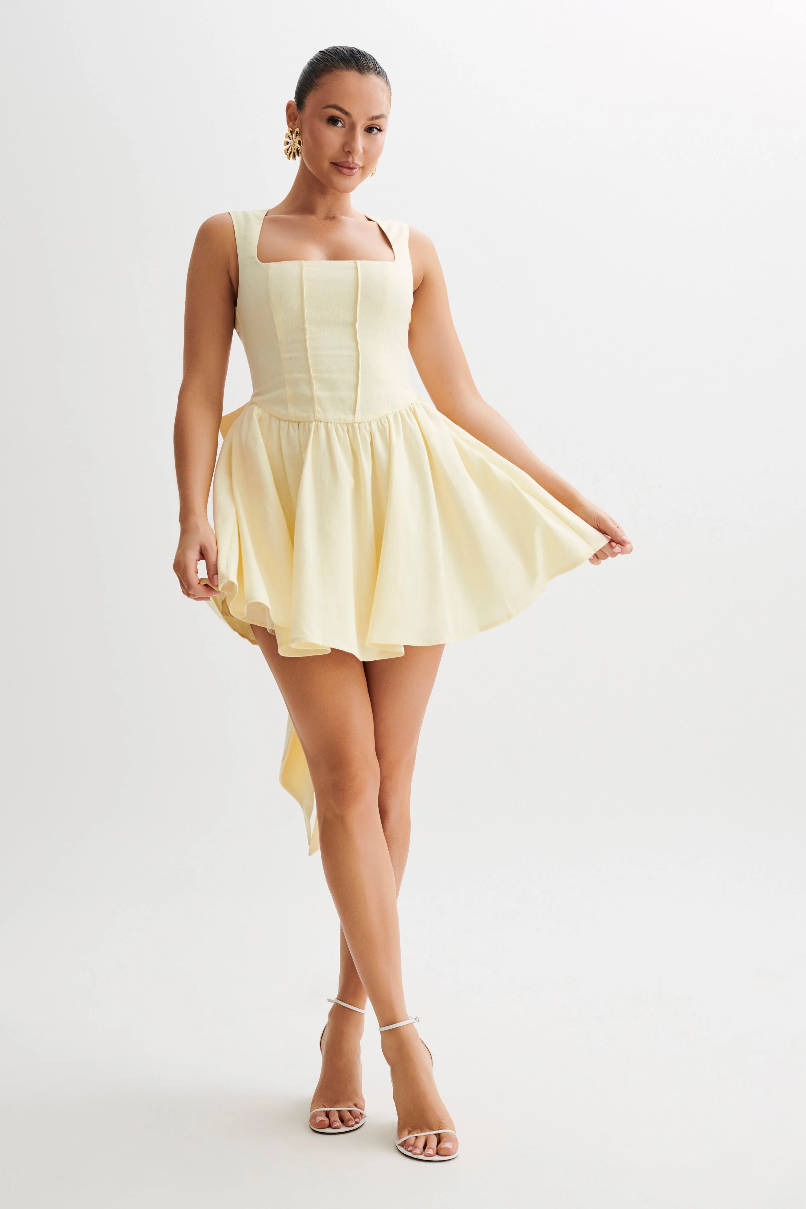 Front view of an elegant V-neck A-line mini homecoming dress.
