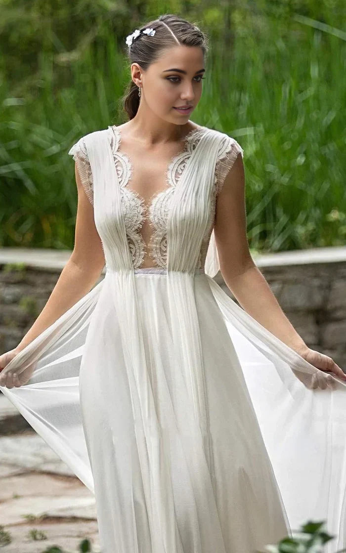 Close-up of the intricate lace and chiffon fabric on the A-line V-neck wedding dress.
