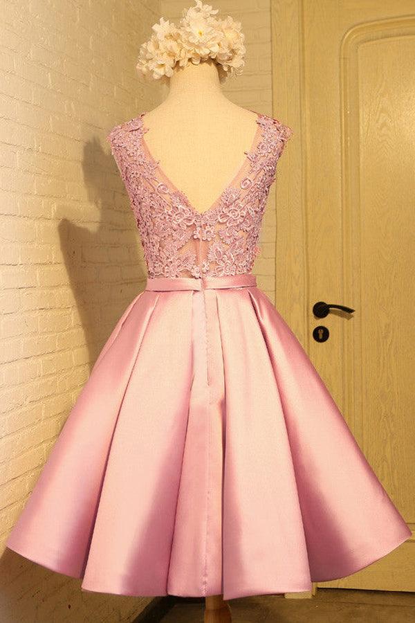 Side view of a short satin homecoming dress featuring appliques and a bowknot.