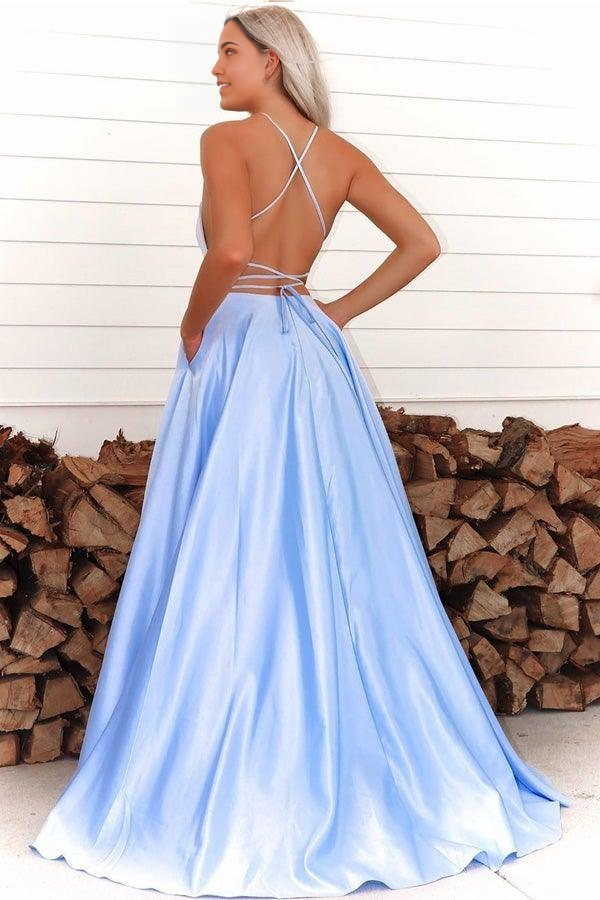 Back view of royal blue evening gown with spaghetti straps.