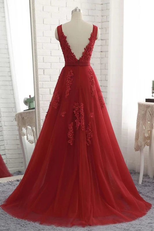 Back view of a sleeveless appliqued tulle evening gown.