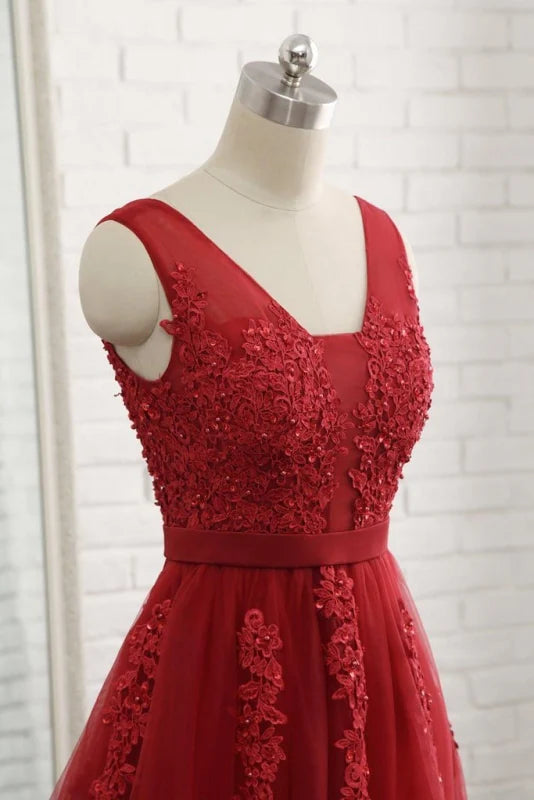 Side view of a formal V-neck floor-length dress.