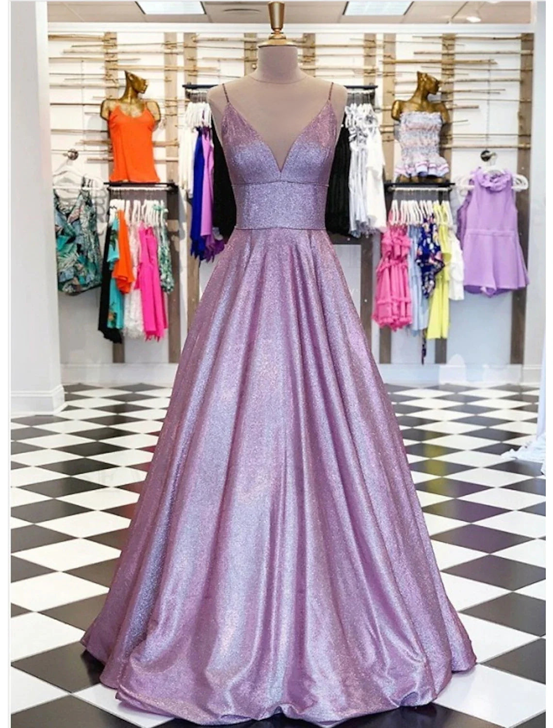 Elegant V-neck ball gown with lace and pleats, floor-length.