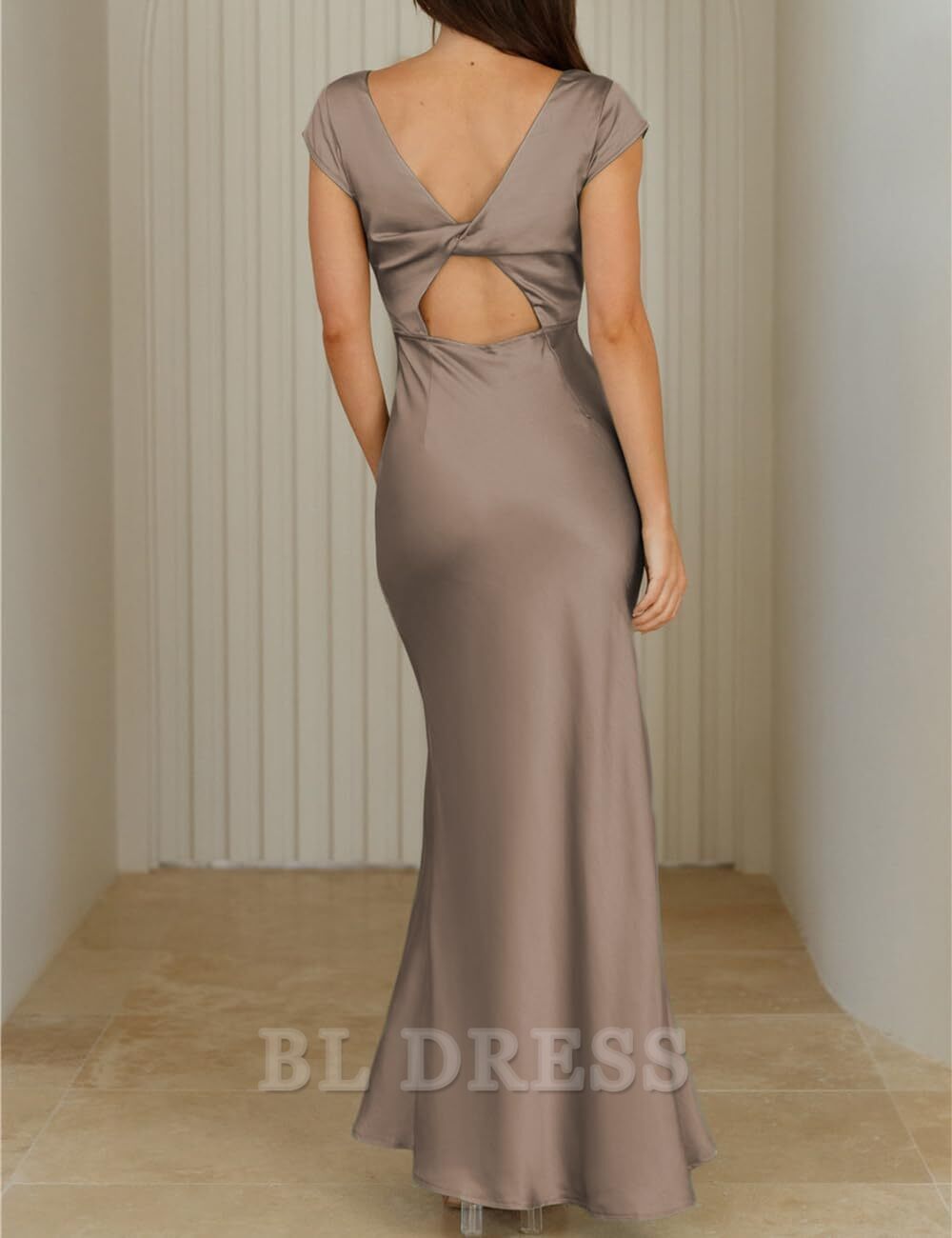 Back view of the elegant satin formal gown, showcasing the backless design.