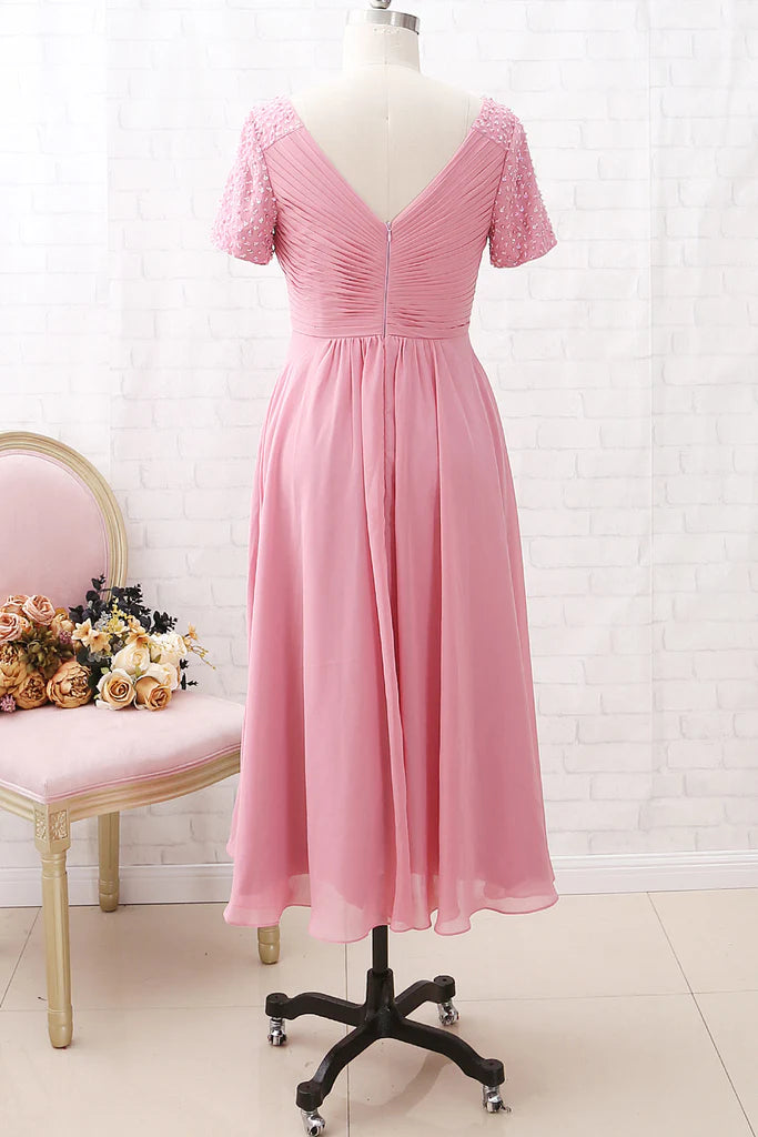 Back view of the V-neck chiffon A-line tea length mother of the bride dress.