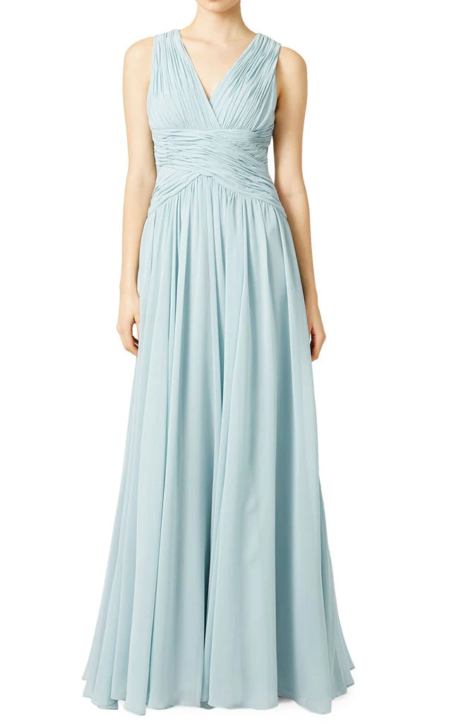 Elegant V-neck chiffon formal gown with spaghetti straps.