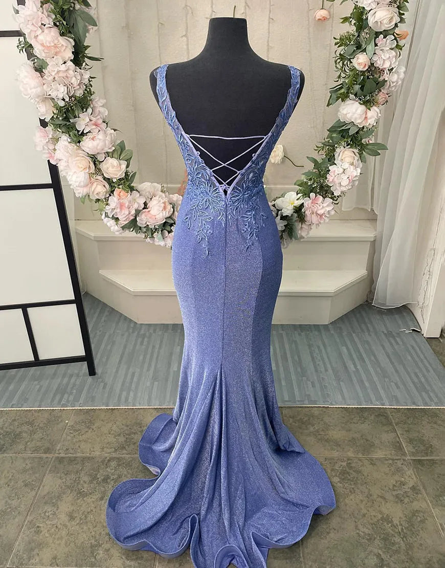 Full view of a purple V-neck prom dress featuring appliques and a corset back.