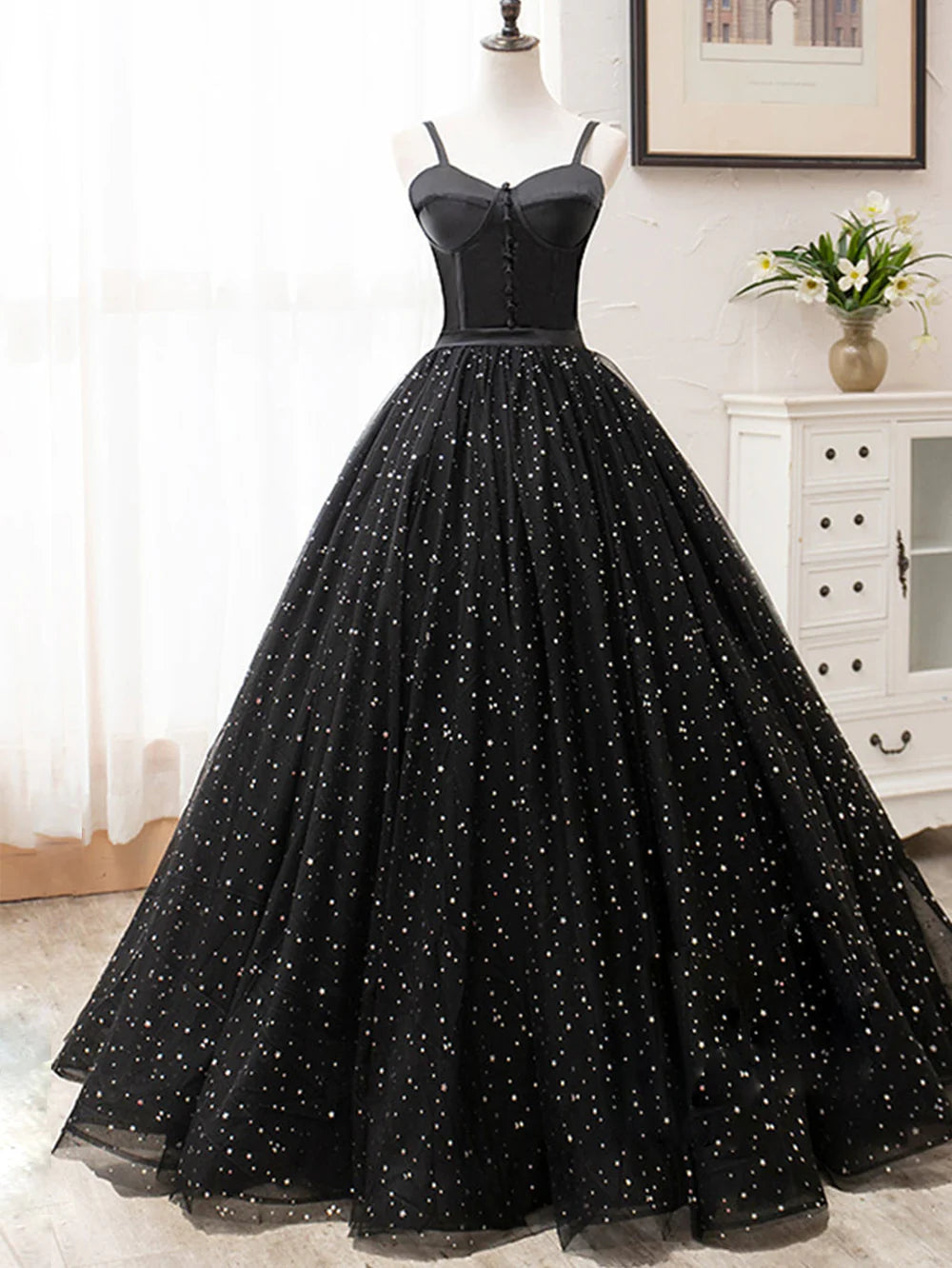 Model wearing a sparkling V-neck glitter long prom dress, full view.