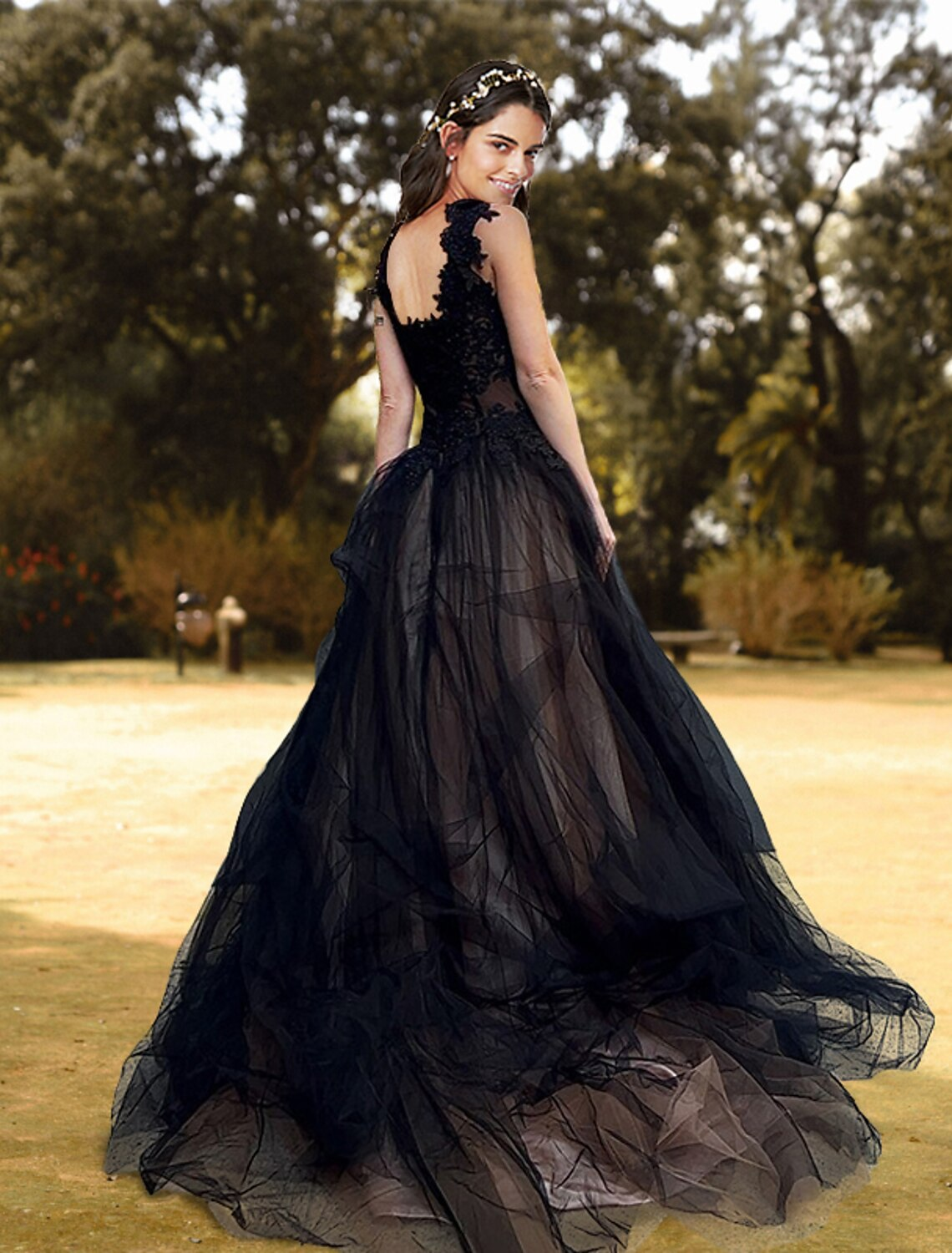 Back view of an elegant V-neck ball gown prom dress with a court train.