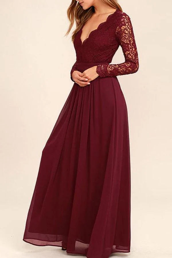 Elegant V-neck long sleeve lace chiffon prom dress on a model.