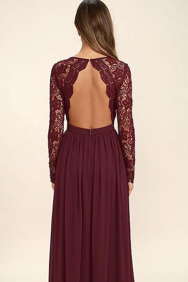 Close-up of the lace bodice and flowing chiffon skirt of the prom dress.