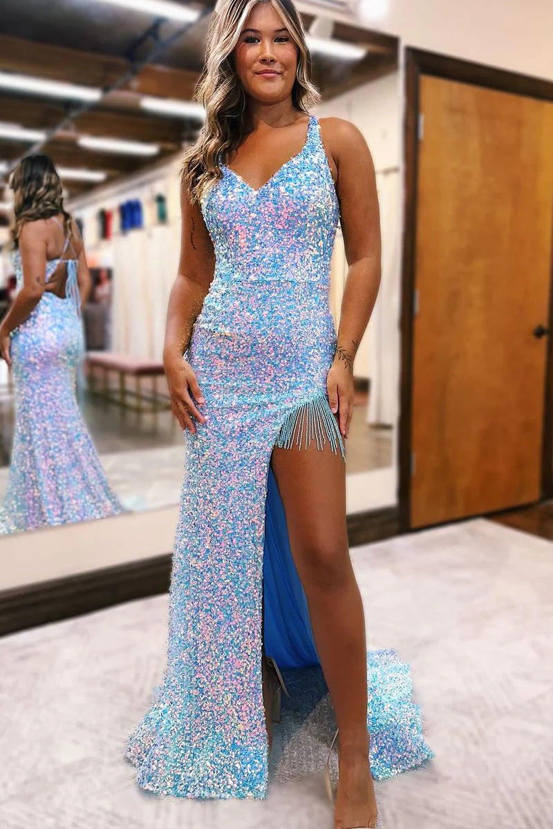 Side profile of a model showcasing the mermaid silhouette of the V-neck prom dress.