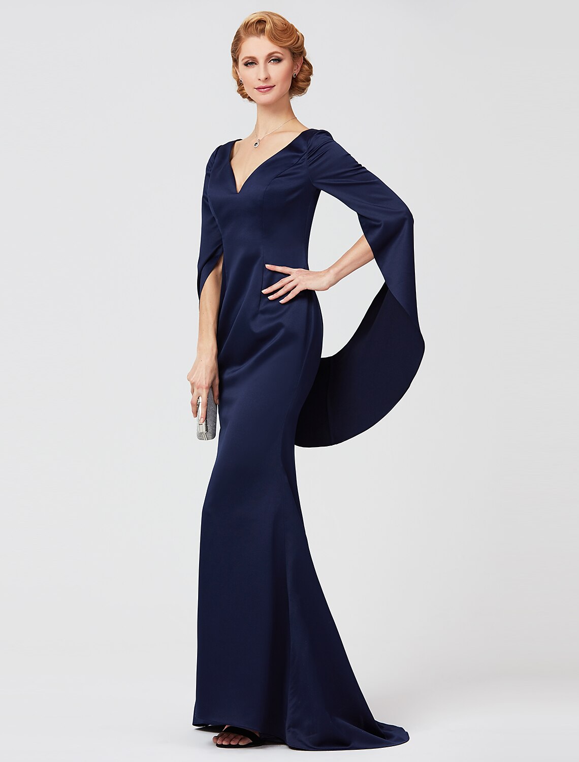 Side profile of the sophisticated mermaid trumpet dress.