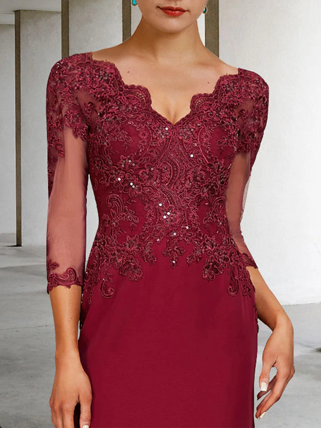 Side view of the mermaid trumpet gown, highlighting the court train and lace details.