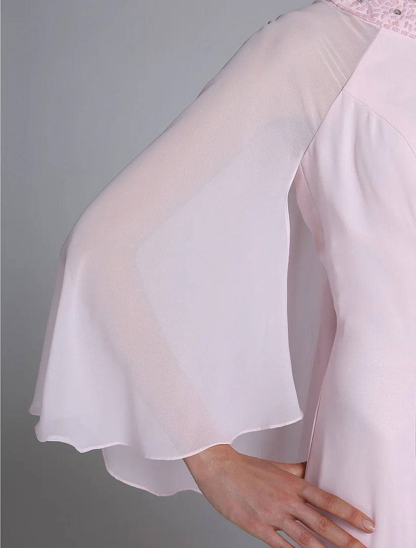Full view of the mermaid trumpet Mother of the Bride dress with long sleeves.