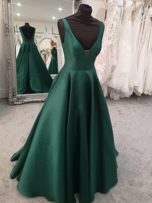 Back view of a sleeveless satin open back evening dress.