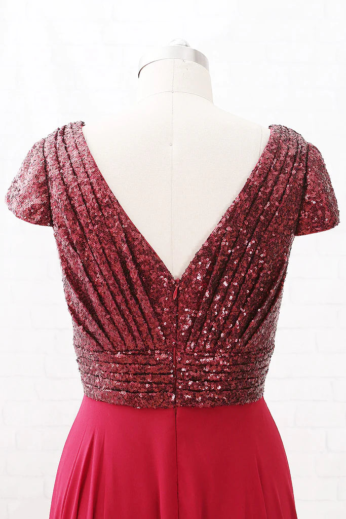 Back view of a sleeveless V-neck sequin chiffon high-low formal dress.