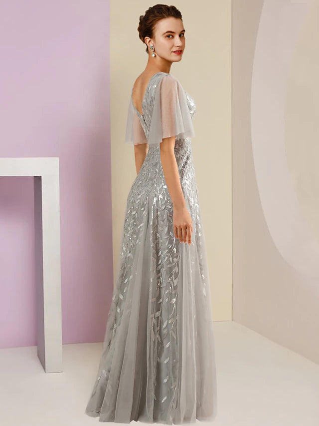 Back view of the floor-length sheath Mother of the Bride dress with pleats.