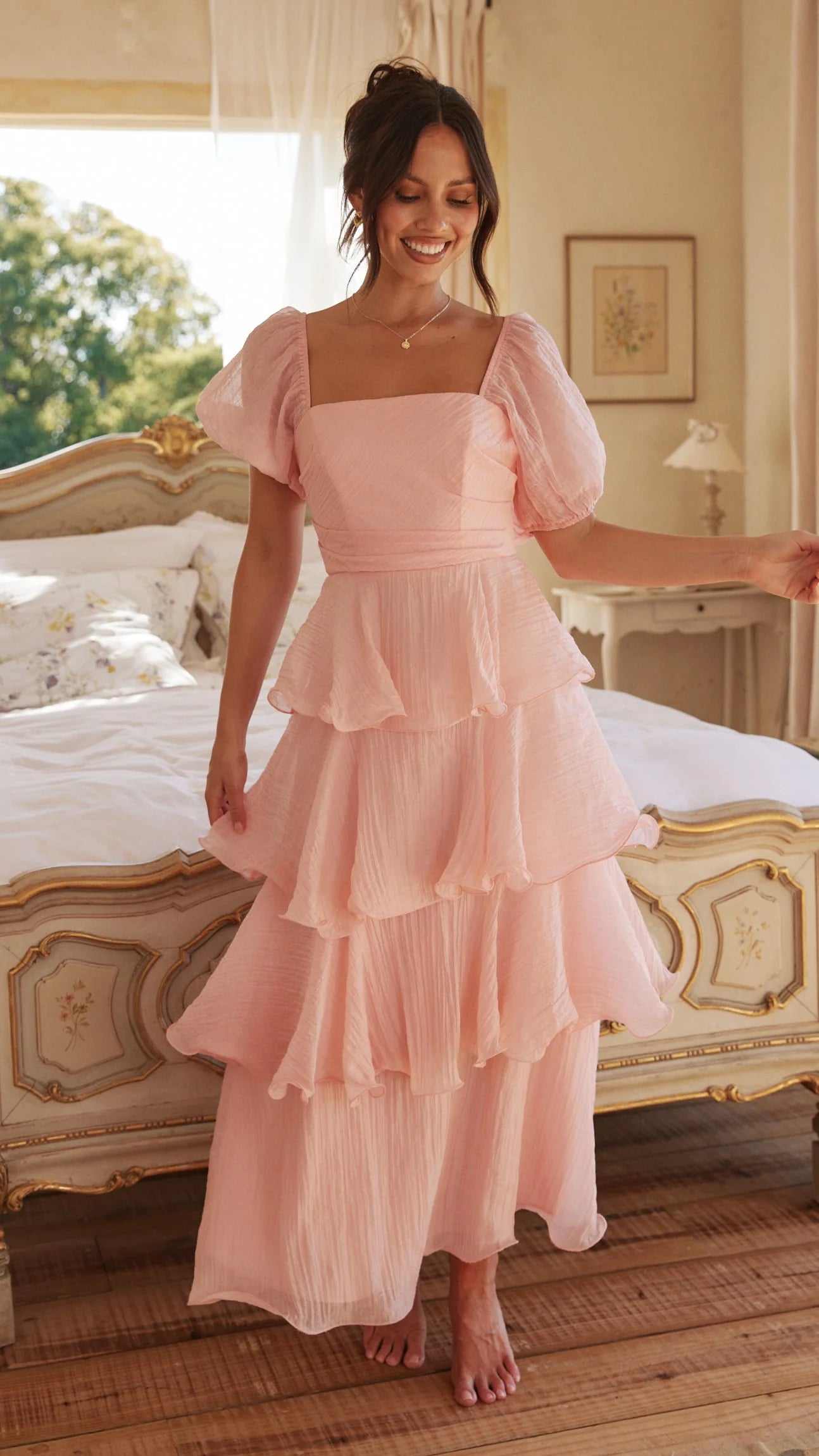 Back view of the elegant short sleeve maxi dress.