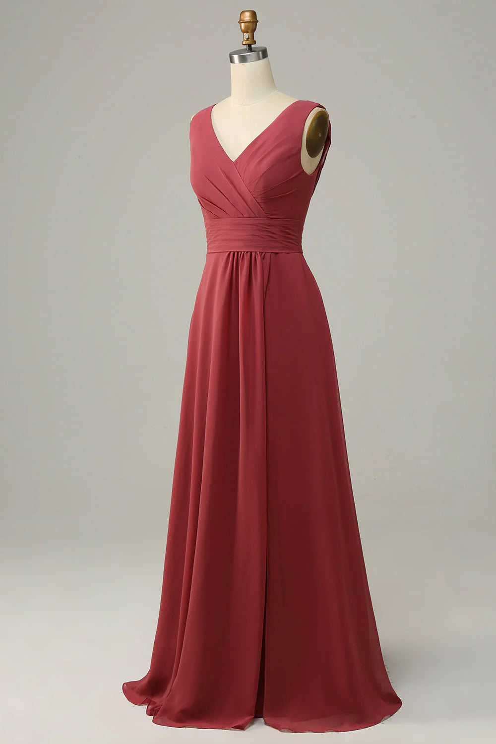 Close-up of the V-neckline and chiffon fabric of the bridesmaid dress.