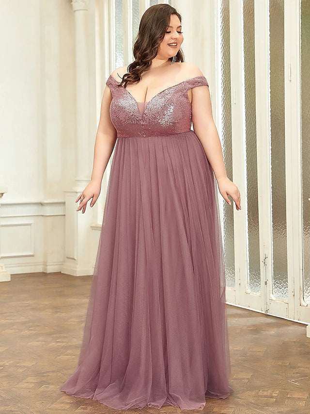 Back view of the floor-length tulle bridesmaid dress with graceful draping.