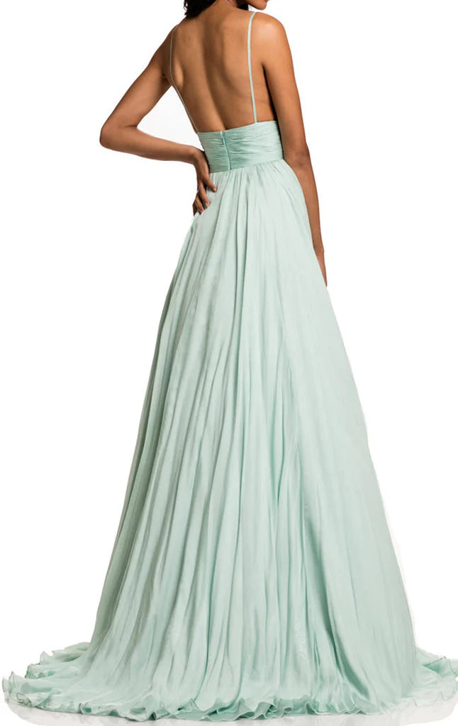 Flowy V-neck chiffon gown with delicate spaghetti straps.