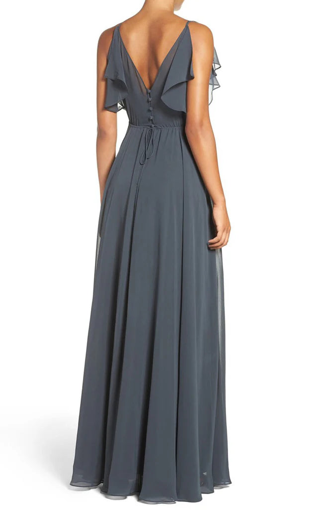 Flowy chiffon evening dress with V neck and delicate straps.