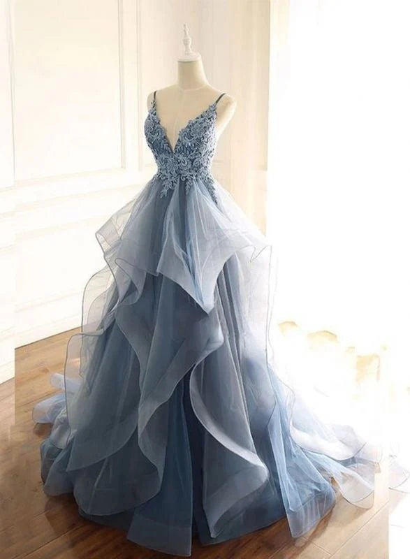 Elegant V-neck spaghetti strap prom dress with ruffles.