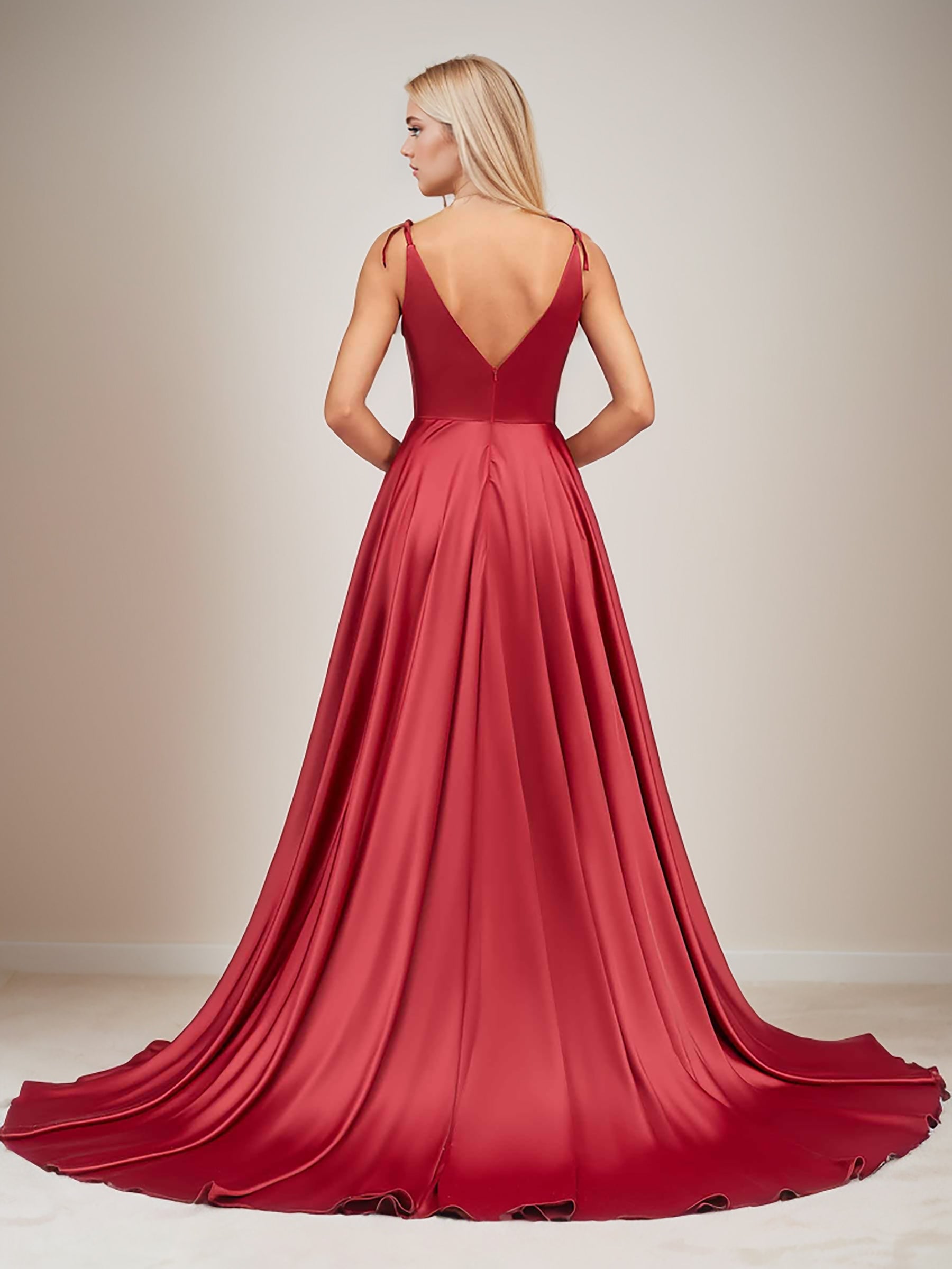Model wearing a cinnabar red V-neck split long formal dress.