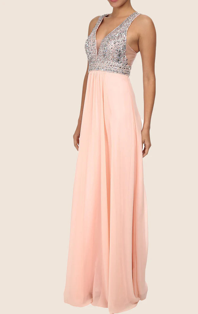 Side profile of a woman wearing a crystal-embellished V-neck maxi dress.