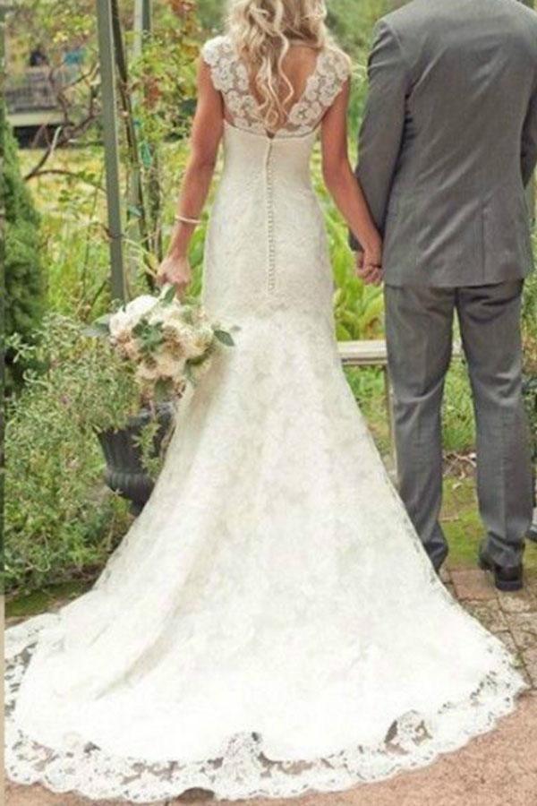 Back view of a Trumpet Mermaid lace wedding dress with a court train.