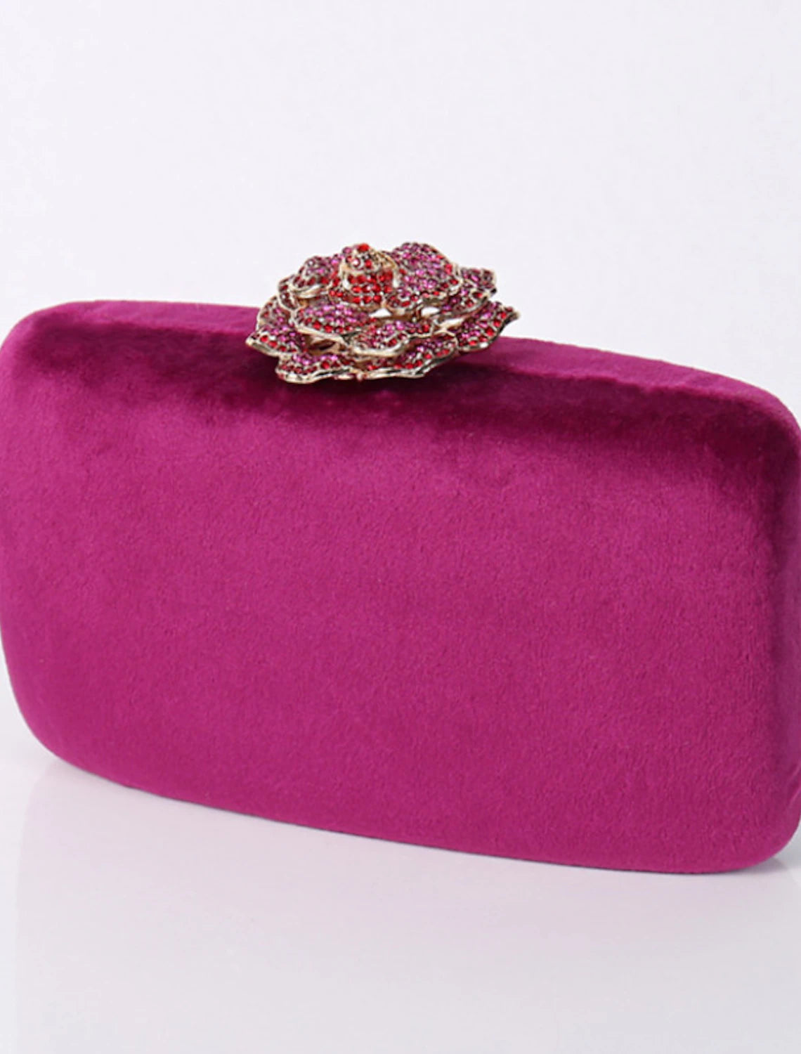 Back of the velvet clutch bag, featuring a smooth, plain finish.