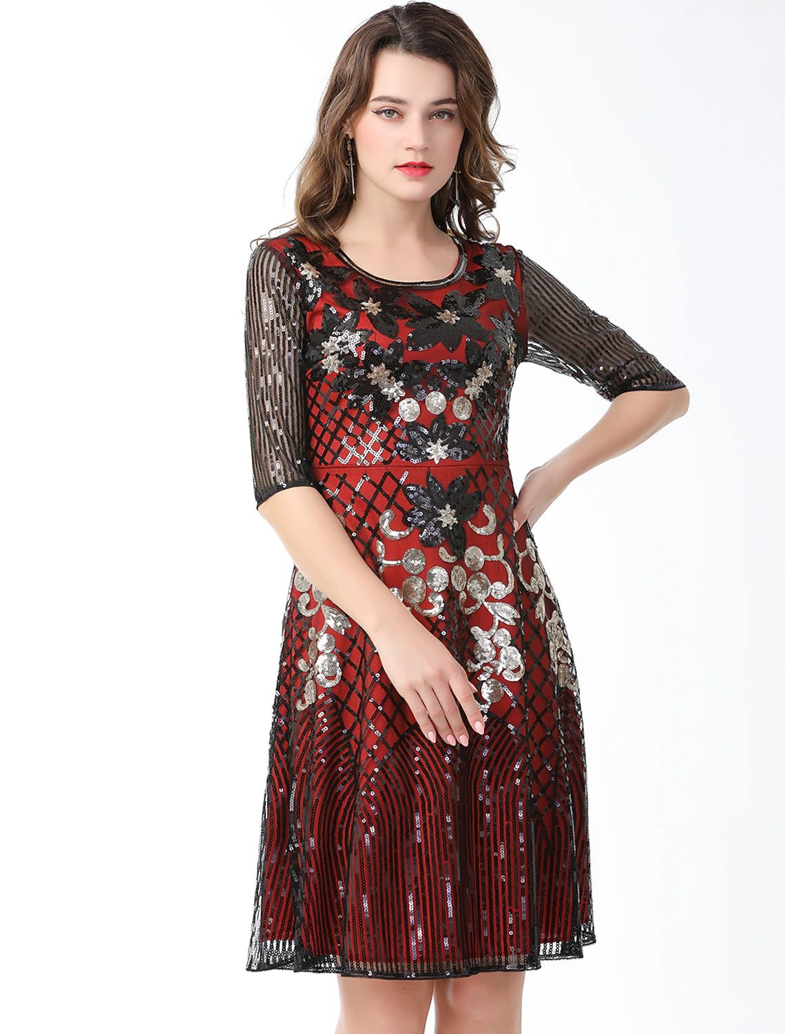 Close-up of the sequin splicing and jewel neck on the A-line dress.