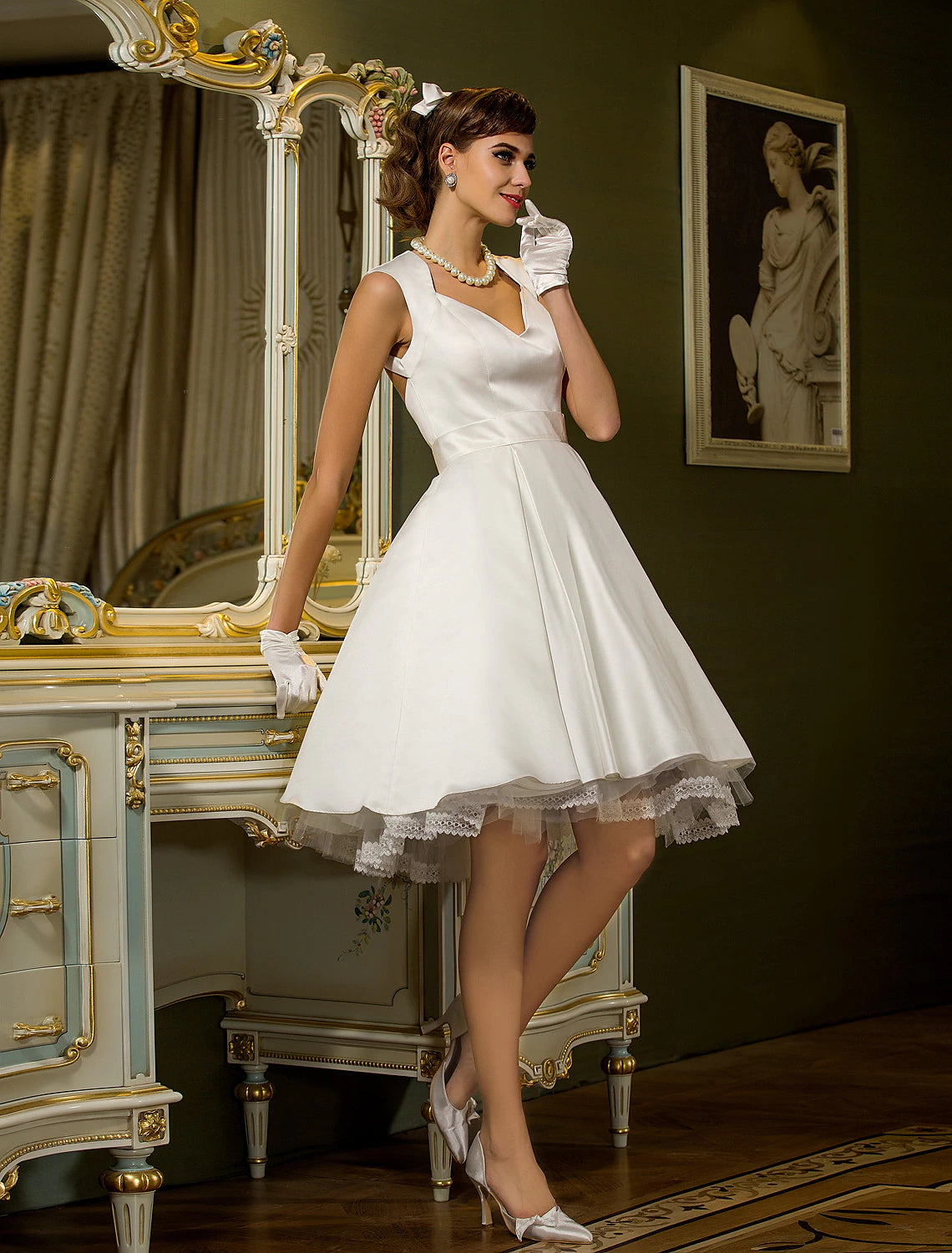 Side view of the white satin wedding dress, highlighting the A-line silhouette.