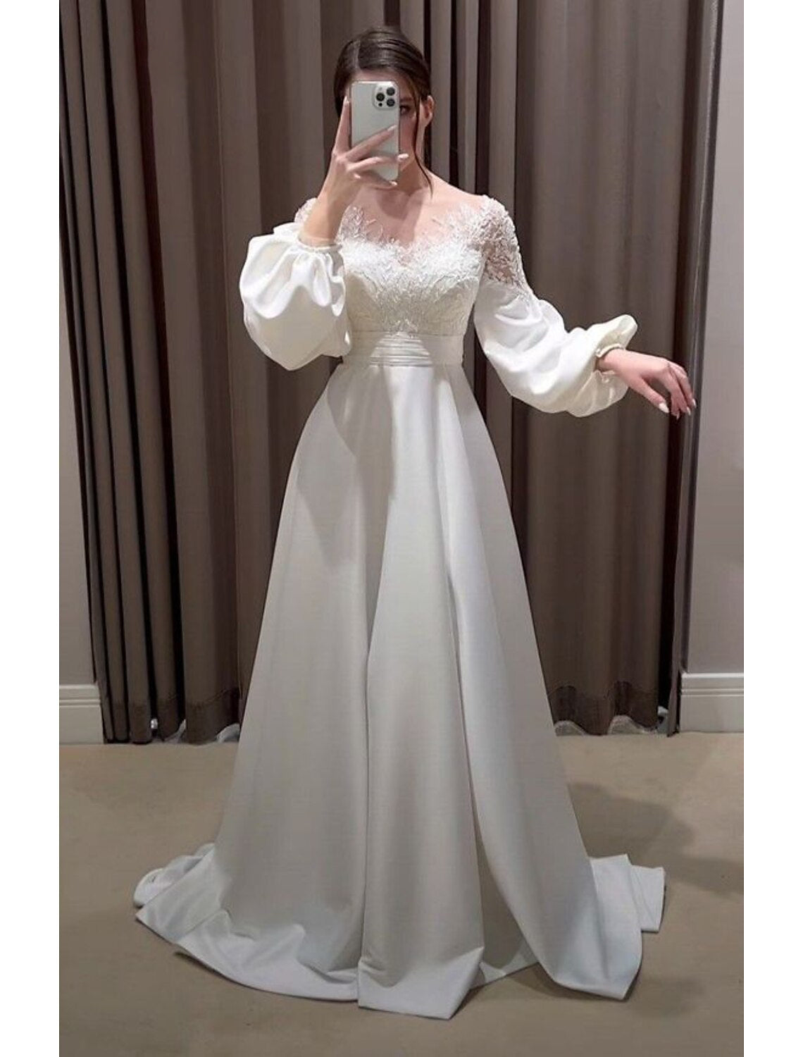 Vintage A-Line V-neck long sleeve satin wedding dress with embroidery and sweep train.