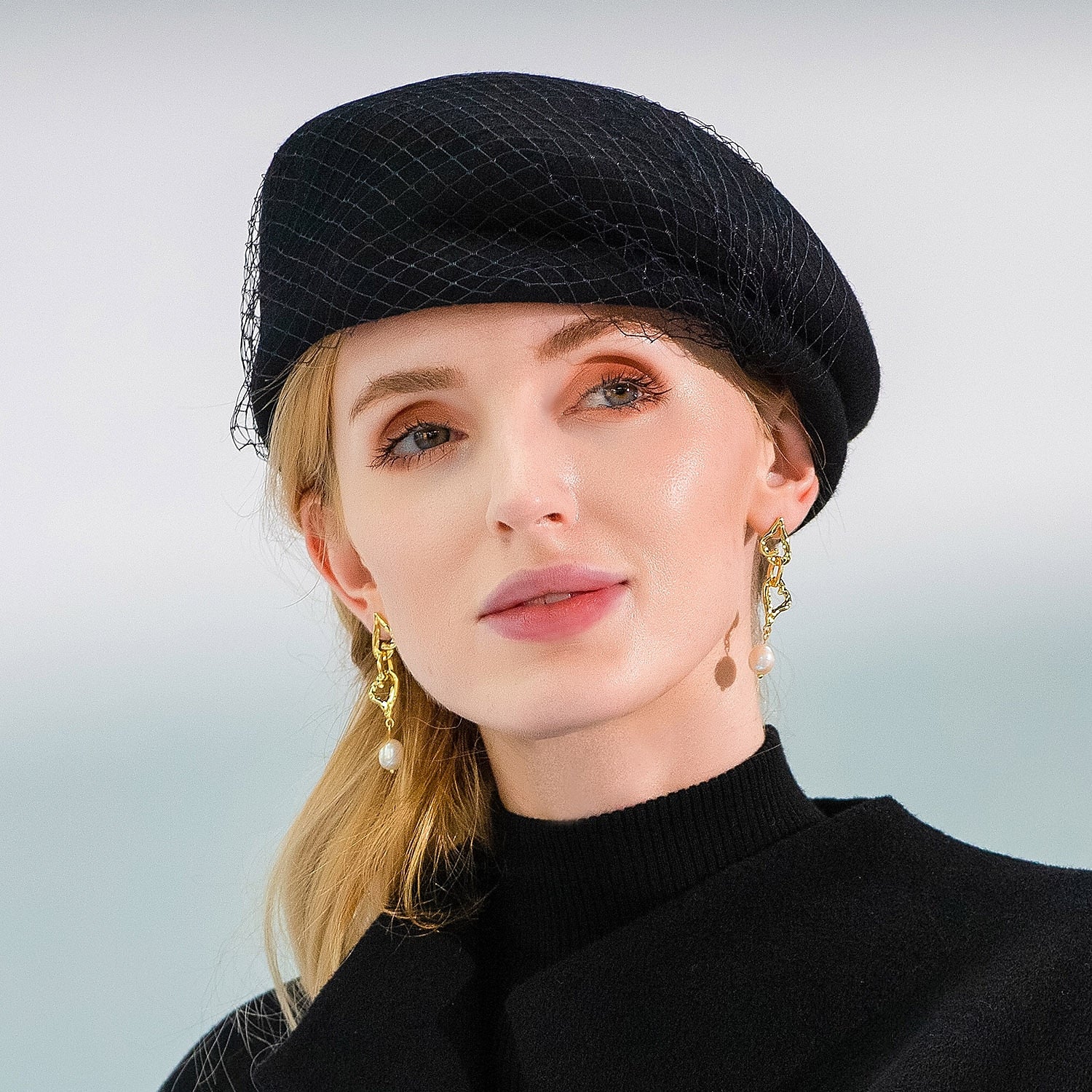 Side view of the vintage style headwear with tulle detail.