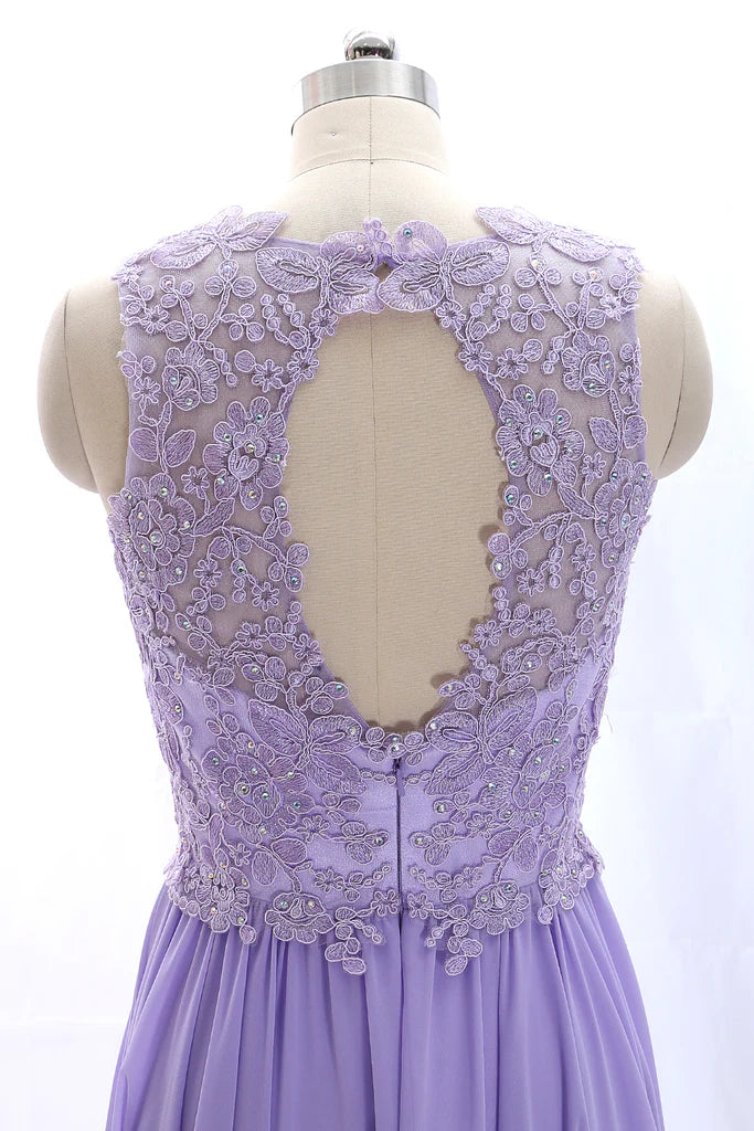Side view of a woman wearing a vintage spaghetti strap prom dress.
