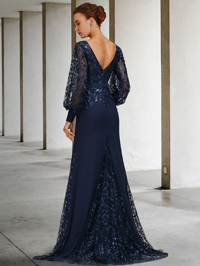 Back view of the Mermaid Trumpet gown showing sweep train and sequin lace details.