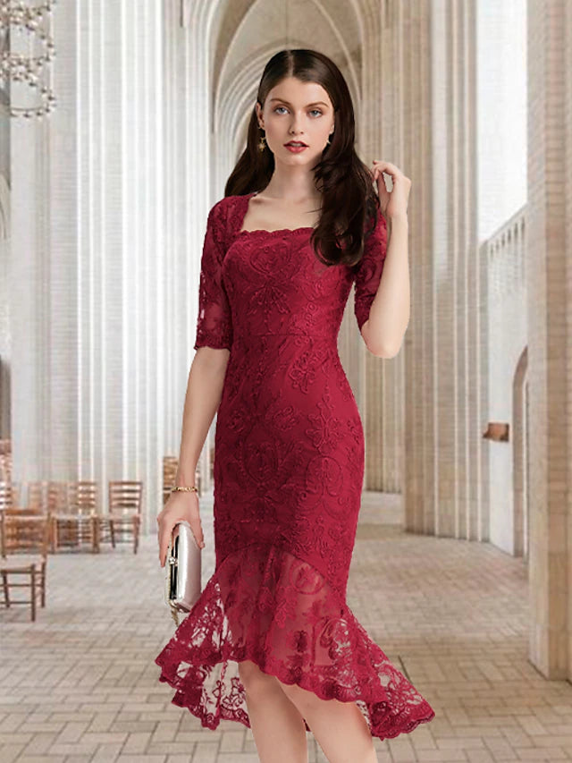Back view of the mermaid trumpet dress showing high-low asymmetrical hem.