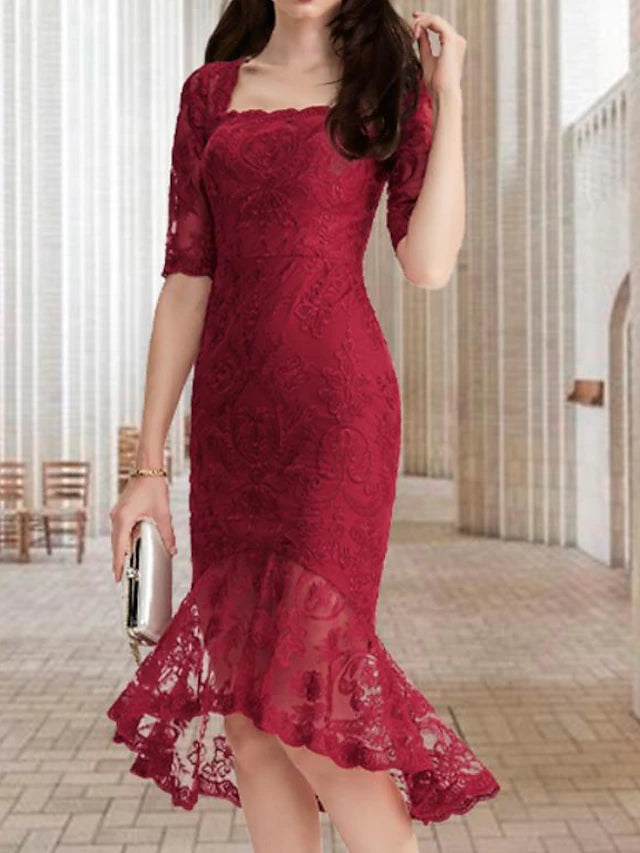 Close-up of the square neckline and half sleeves with lace appliques.