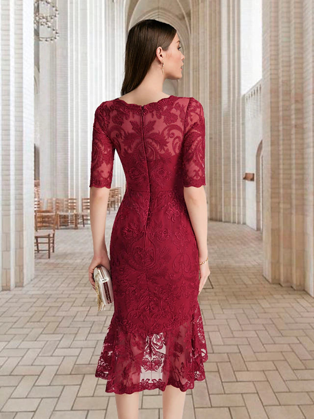 Side view of the vintage mother of the bride gown, highlighting the silhouette.