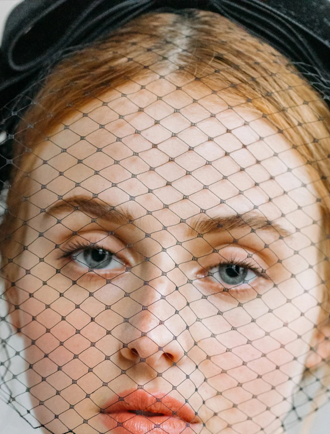Close-up of pure tulle vintage blusher birdcage wedding veil.