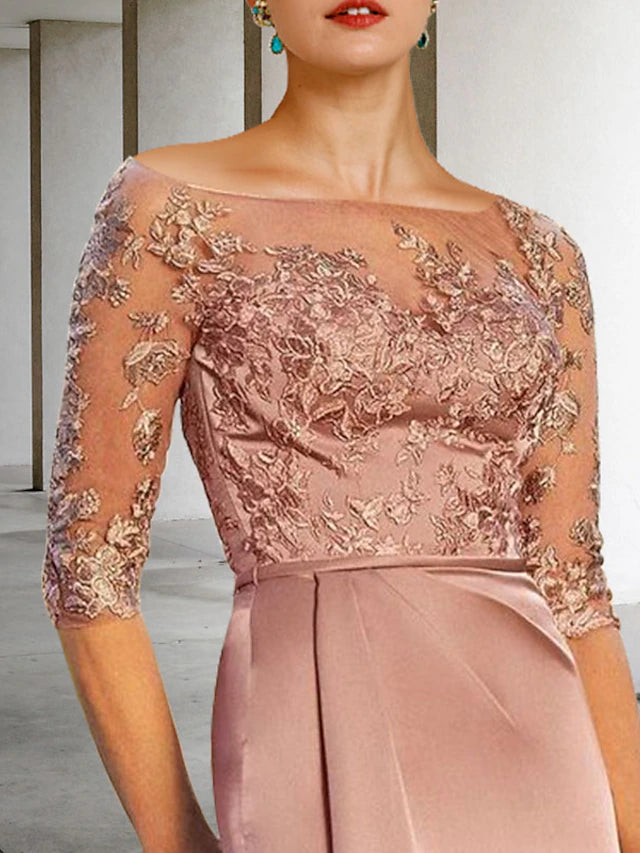 Side view of the elegant Mother of the Bride dress, showcasing side-draping and delicate appliques.