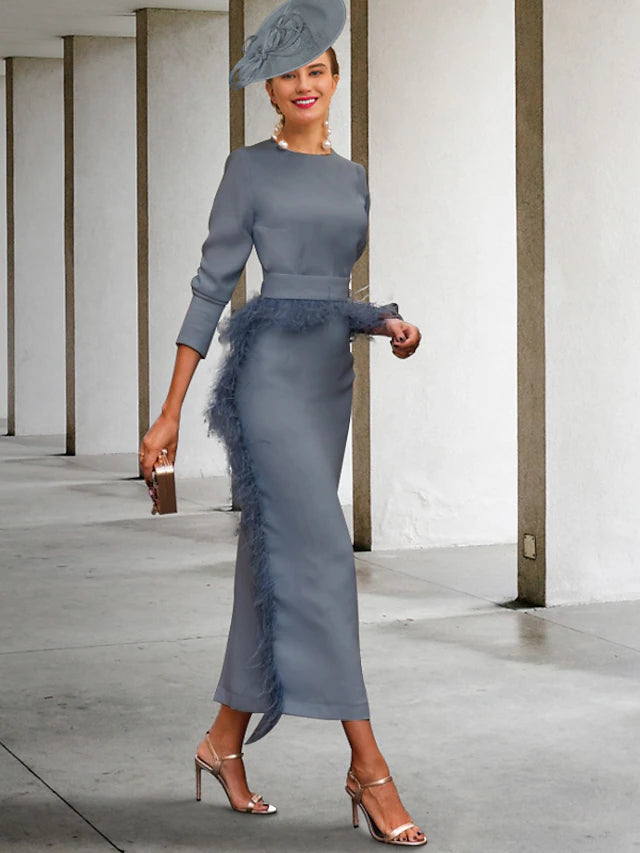Elegant vintage sheath Mother of the Bride dress with feather sash.