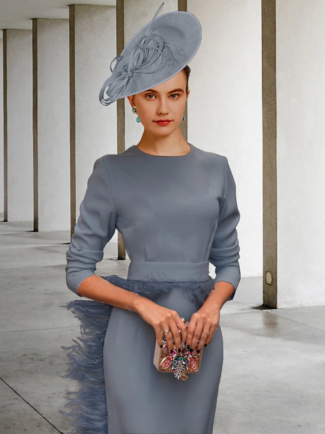 Side view of the sheath Mother of the Bride dress, highlighting the feather sash.