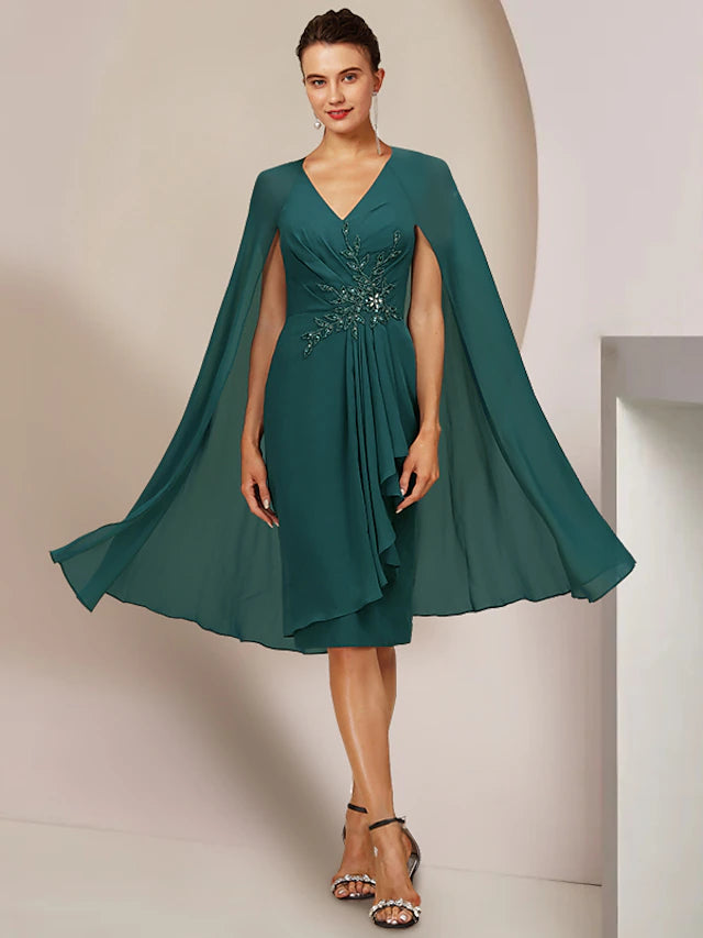 Elegant V-neck chiffon knee-length dress with pleats and beading.